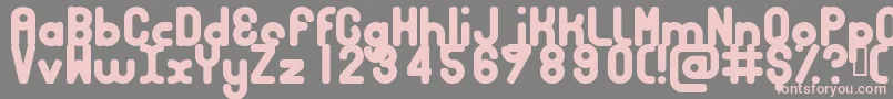 フォントBubbcb – 灰色の背景にピンクのフォント