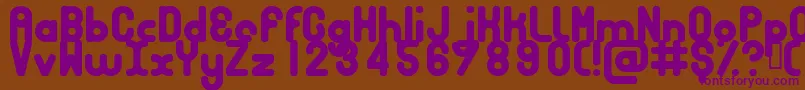 フォントBubbcb – 紫色のフォント、茶色の背景