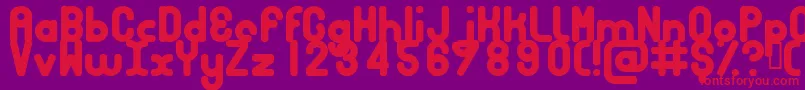 フォントBubbcb – 紫の背景に赤い文字