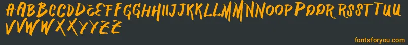 VtksMercado Font – Orange Fonts on Black Background