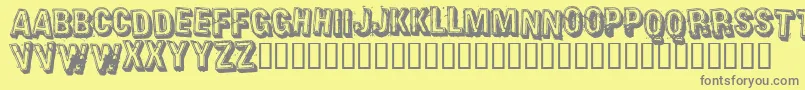 Heavr-fontti – harmaat kirjasimet keltaisella taustalla