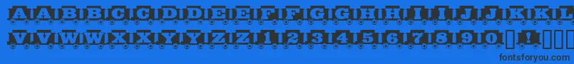 Grandfunkrr Font – Black Fonts on Blue Background