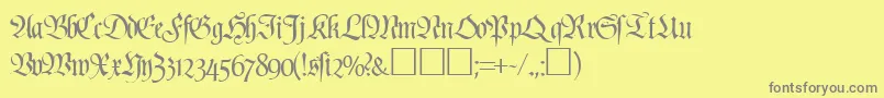Czcionka PoemfrakturRegularDb – szare czcionki na żółtym tle