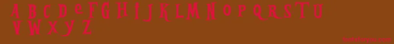 フォントBleedingFreaksDemo – 赤い文字が茶色の背景にあります。