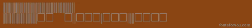 フォントC39p72dmtt – 茶色の背景に灰色の文字
