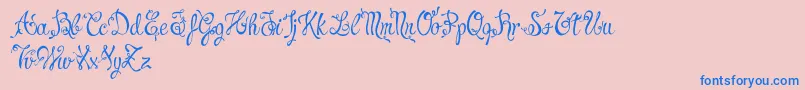 CharmingNormalDemo-Schriftart – Blaue Schriften auf rosa Hintergrund