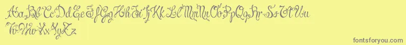 CharmingNormalDemo-fontti – harmaat kirjasimet keltaisella taustalla