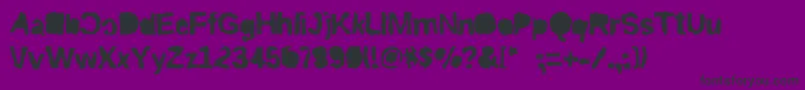 フォントRiptrashmirror – 紫の背景に黒い文字
