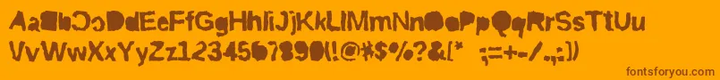 Riptrashmirror-Schriftart – Braune Schriften auf orangefarbenem Hintergrund
