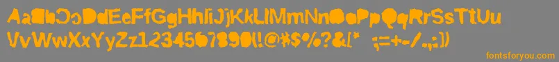 フォントRiptrashmirror – オレンジの文字は灰色の背景にあります。