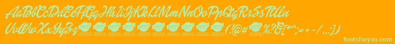 DolliescriptPersonaluse Font – Green Fonts on Orange Background