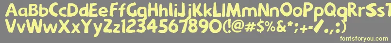 Menkaya-Schriftart – Gelbe Schriften auf grauem Hintergrund