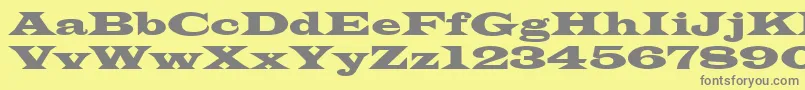 Azlatinwidectt Font – Gray Fonts on Yellow Background