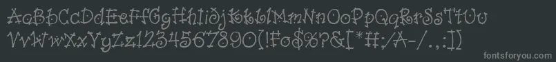 フォントDancinLetPlain.1.0 – 黒い背景に灰色の文字