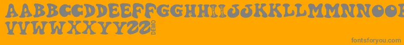 Hartydemo-Schriftart – Graue Schriften auf orangefarbenem Hintergrund