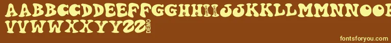 Hartydemo-Schriftart – Gelbe Schriften auf braunem Hintergrund