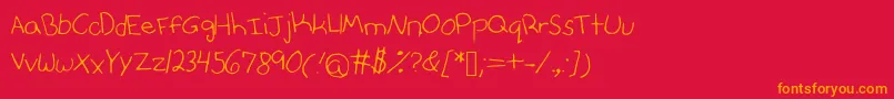 Anniesfontwithfaces Font – Orange Fonts on Red Background