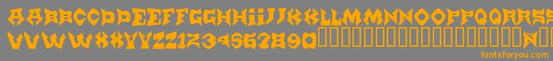 フォントMunster – オレンジの文字は灰色の背景にあります。