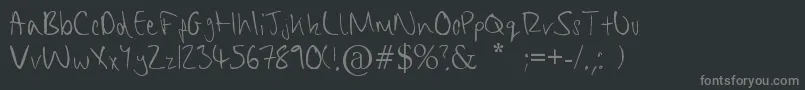 ChippyHandwriting-fontti – harmaat kirjasimet mustalla taustalla