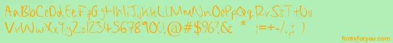 Fonte ChippyHandwriting – fontes laranjas em um fundo verde