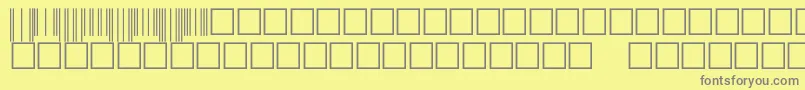 フォントFimcodestt – 黄色の背景に灰色の文字