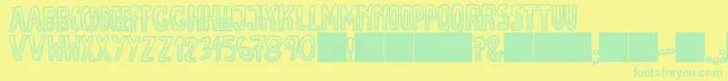 JmhEscamasWhiteDown Font – Green Fonts on Yellow Background