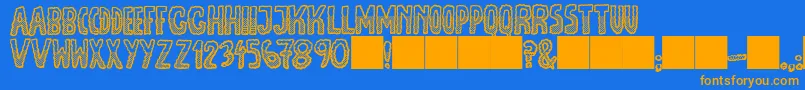 JmhEscamasWhiteDown Font – Orange Fonts on Blue Background