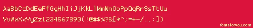 Proggytinytt-fontti – keltaiset fontit punaisella taustalla