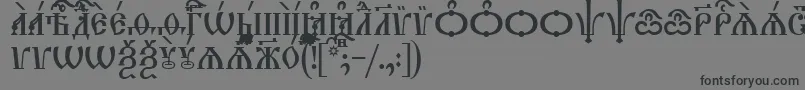 フォントTriodionCapsIeucs – 黒い文字の灰色の背景