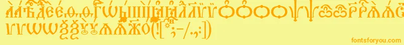 フォントTriodionCapsIeucs – オレンジの文字が黄色の背景にあります。