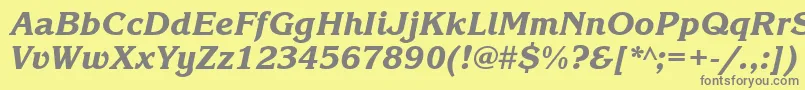 フォントKorinnablackbttItalic – 黄色の背景に灰色の文字