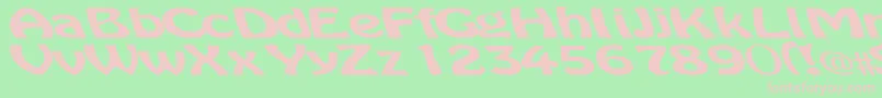 Microdot Font – Pink Fonts on Green Background