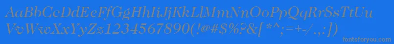 CaslonBookitalic-fontti – harmaat kirjasimet sinisellä taustalla