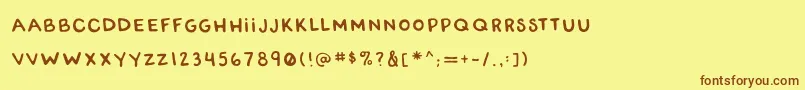 フォントRwatangocharlieSlanted – 茶色の文字が黄色の背景にあります。