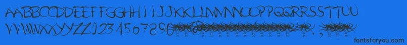 Czcionka Pelos – czarne czcionki na niebieskim tle