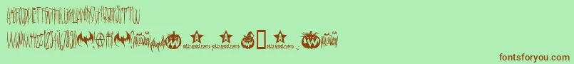 Fonte Hello Ween  – fontes marrons em um fundo verde