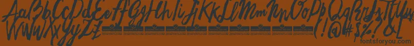 FreehandBrushTrial Font – Black Fonts on Brown Background