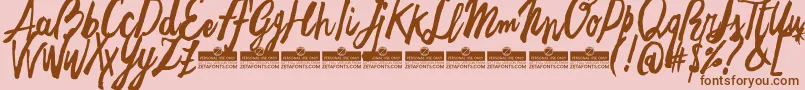 Czcionka FreehandBrushTrial – brązowe czcionki na różowym tle