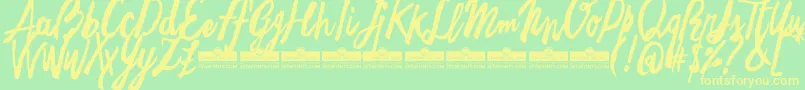 FreehandBrushTrial Font – Yellow Fonts on Green Background