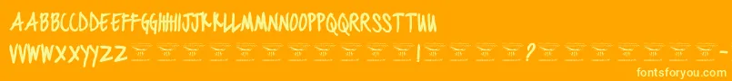 BlackjacketboysBold-fontti – keltaiset fontit oranssilla taustalla