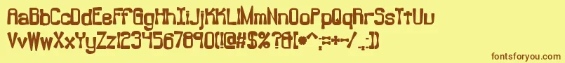 BacklashBrk Font – Brown Fonts on Yellow Background