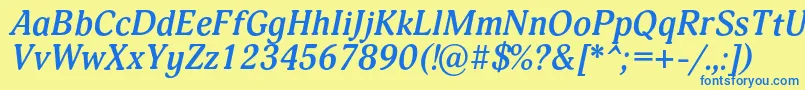 フォントAdoniscBolditalic – 青い文字が黄色の背景にあります。