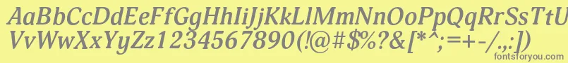 フォントAdoniscBolditalic – 黄色の背景に灰色の文字