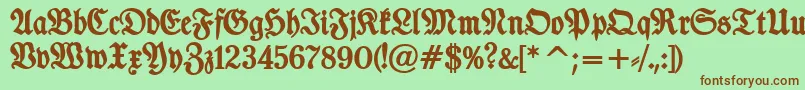 Fonte TypographerfrakturBold – fontes marrons em um fundo verde