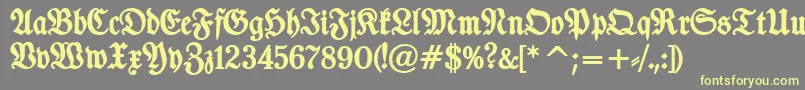 TypographerfrakturBold Font – Yellow Fonts on Gray Background