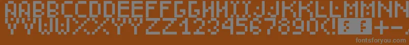 DudeCmon Font – Gray Fonts on Brown Background