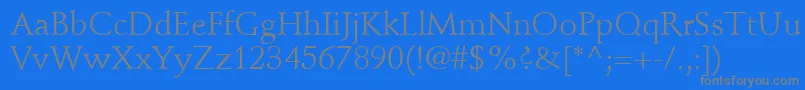 StempelSchneidlerLtRoman-fontti – harmaat kirjasimet sinisellä taustalla