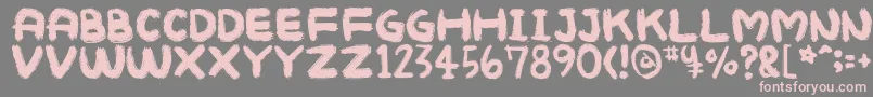 フォントMukokusekikitchen – 灰色の背景にピンクのフォント
