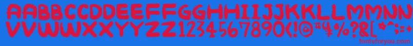 Mukokusekikitchen Font – Red Fonts on Blue Background