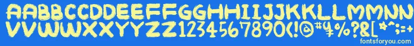 Mukokusekikitchen Font – Yellow Fonts on Blue Background